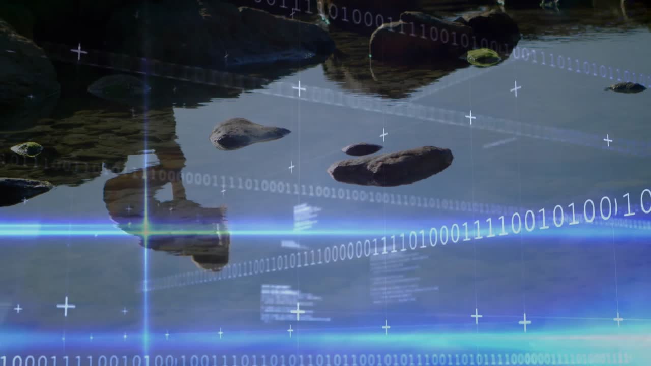 Woman crouching studying tide pool using AR tech overlay showing binary code and blue laser beams