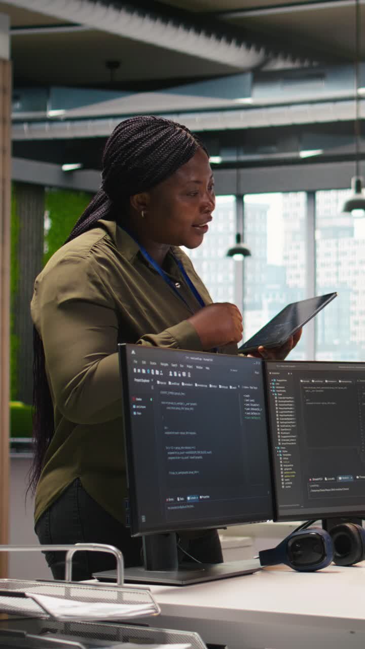 Vertical video Welcoming team assisting intern developing artificial intelligence models