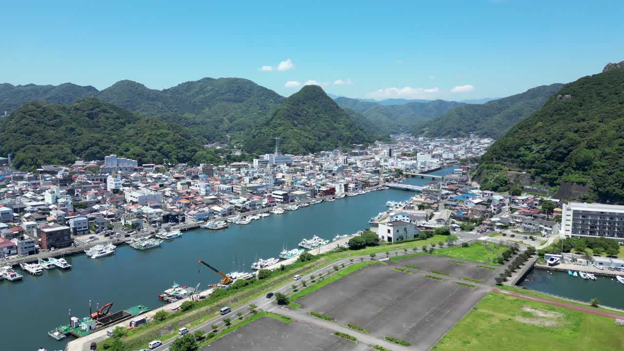 Cinematic drone flight over Shimoda city, on Izu Peninsula on sunny day