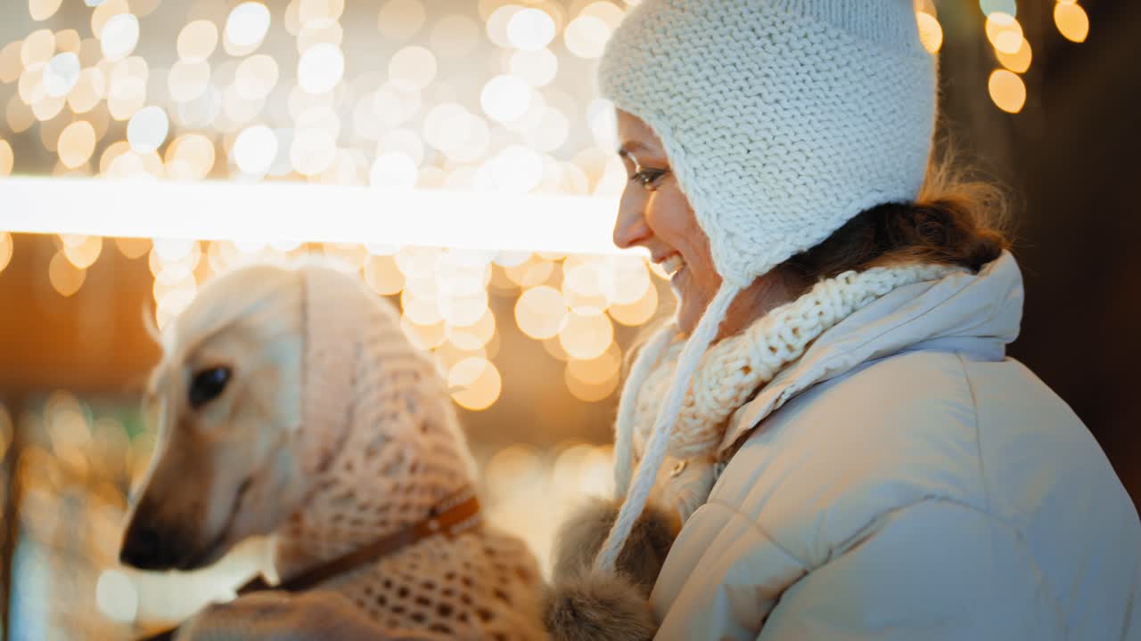 Woman and Dog Enjoying a Winter Night