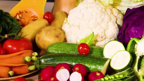 assorted vegetables arranged on a black background