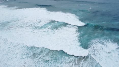 drone shot of the ragging atlantic ocean with big waves