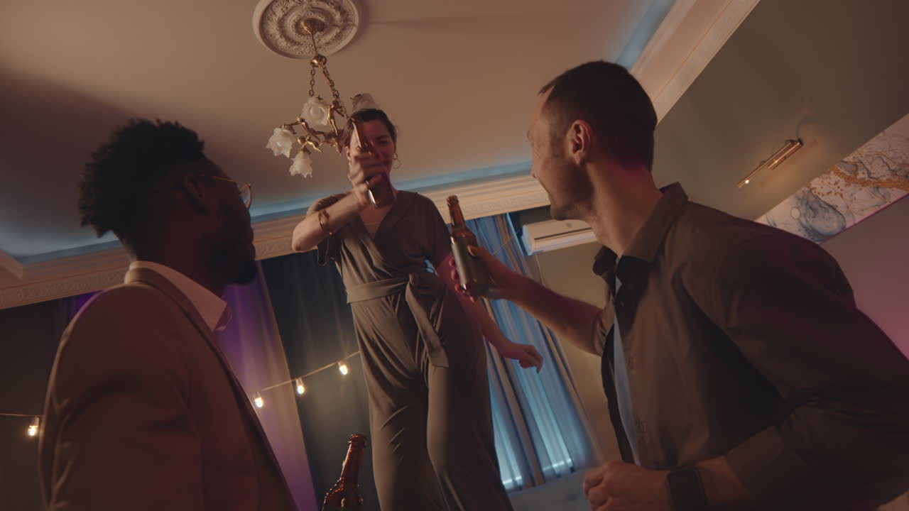 Attractive Woman Dancing on Dinner Table at House Party