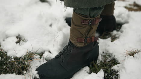 wwii style soldier boots in snow