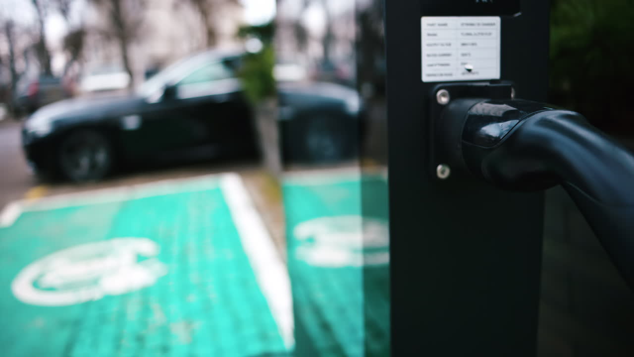 Futuristic black outdoor charging station for electric vehicles