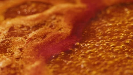 chicken in tomato sauce is boiling on a frying pan with spices. cooking tomato sauce curry with chicken fillet. traditional italian mexican asian dish. high quality studio shot for cafe, restaurant close up.