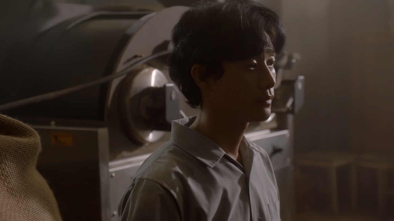 Man Near Coffee Roasting Equipment