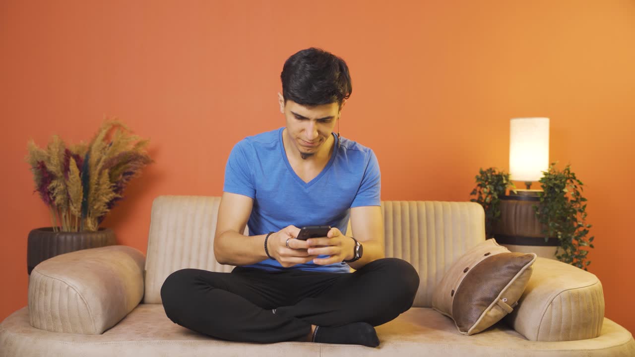 The man who can't use the app on the phone.