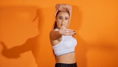 young woman dancing in studio