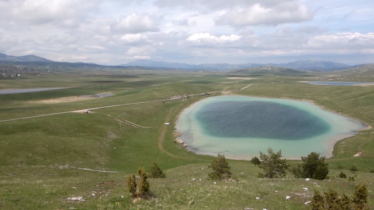panoramic wide view of Durmitor National Park, Zabljak, Montenegro, with Vrazje Jezero or Devils Lake on background