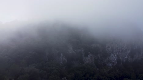 flying through the clouds in mountain