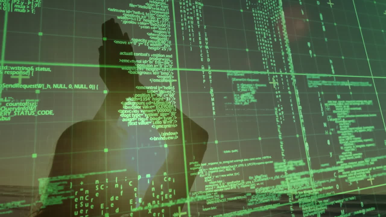 Hands together over green computer code and data, person creating animation