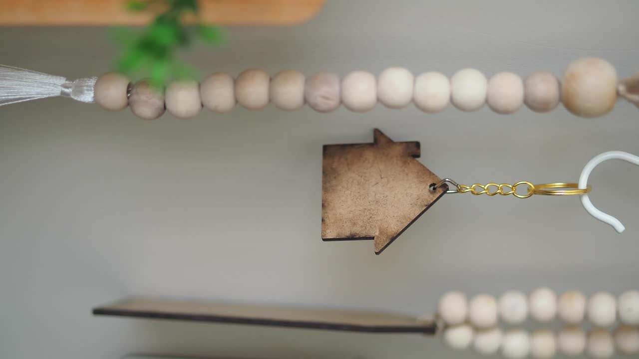 Beaded garland with wooden arrow keychain
