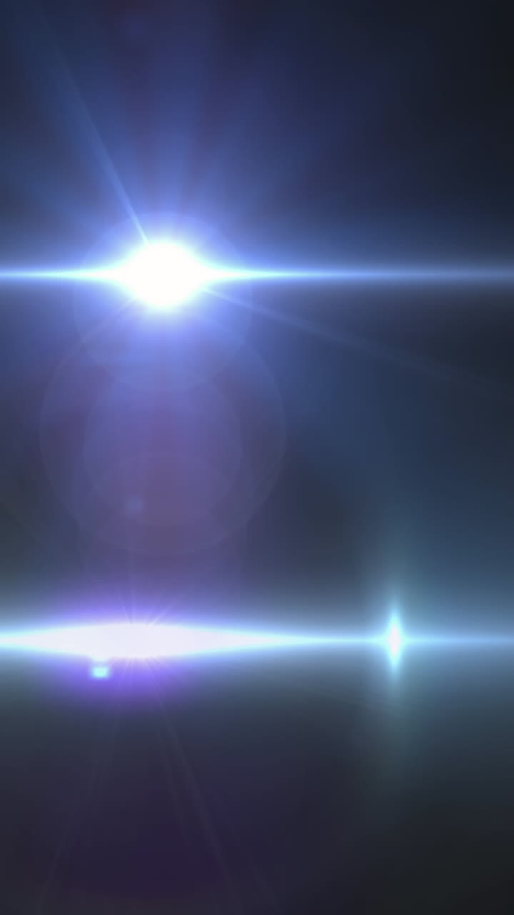 animación del foco con destello de la lente y haces de luz que se mueven sobre un fondo oscuro
