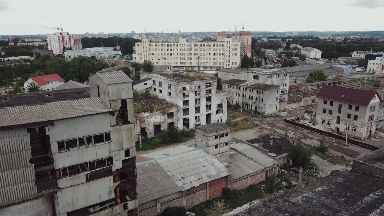 Flight over the destroyed factory. Old industrial building for demolition. Aerial view