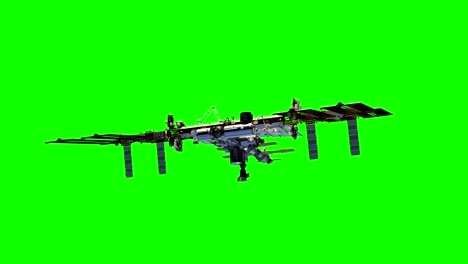 international space station rotates solar panels. green screen. 4k.