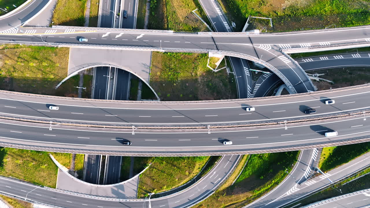 Several levels of the roads in the traffic system. Transport moves by the modern highway conjunction. Top view.