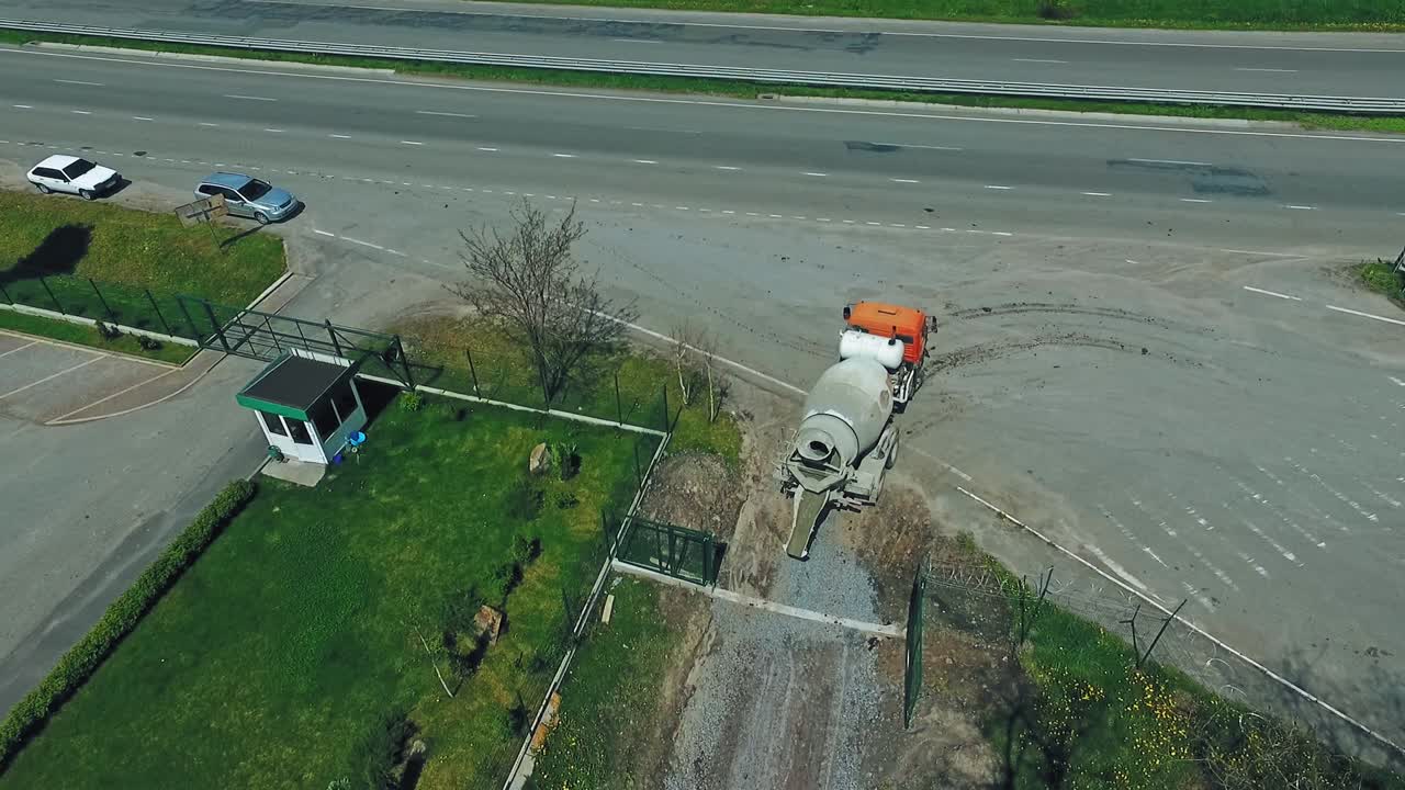 Machine working on construction site. Aerial drone view of construction site