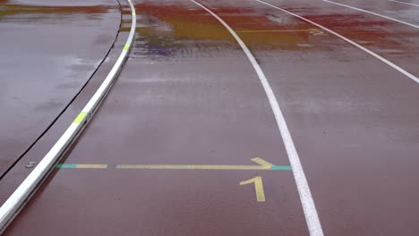 athletics track in the stadium. the ground marks the first runway.