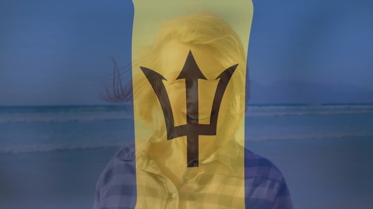 Senior woman standing by sea behind sheer flag, breeze fluttering trident overlay for branding