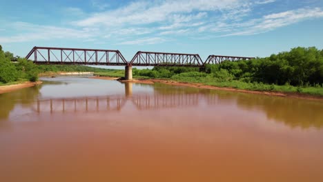 aerial video flying low over the red river in texas