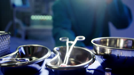 Tensed-male-surgeon-sitting-in-operating-room