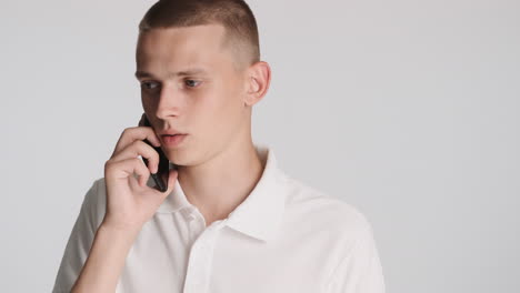 Young-man-talking-on-the-phone