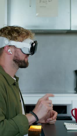 person using virtual reality headset in kitchen