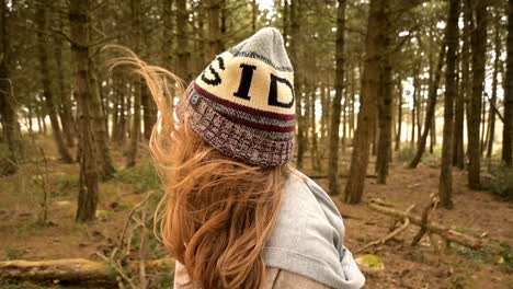 girl in the windy forest