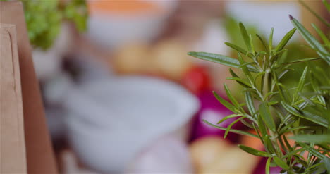 Fresh-Food-Ingredients-On-Wooden-Table-In-Kitchen-5