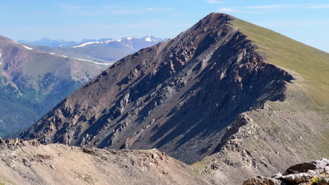 grays and torreys fourteener high elevation peak saddle mountaineering hike hiking adventure rocky mountains continental divide summer sunny blue bird high elevation above alpine landscape snow melt