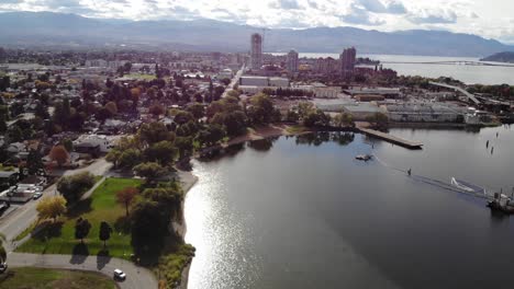 forward drone aerial flight towards downtown kelowna