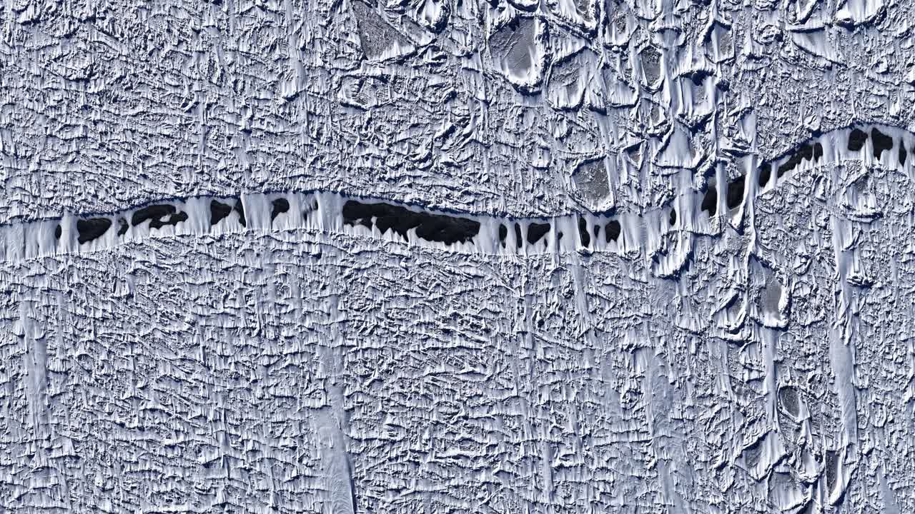 Aerial view of ice texture in Latvia, showcasing nature's intricate patterns