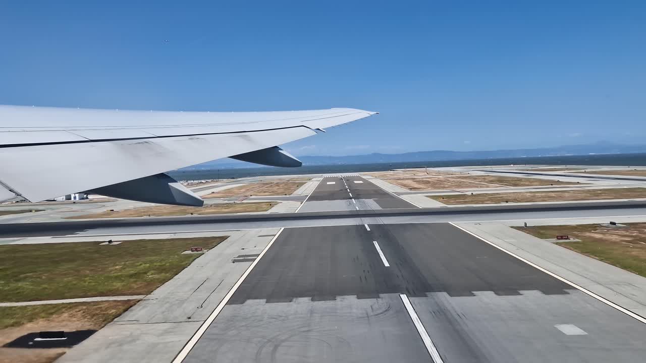Airplane Take Off From San Francisco International Airport, Passenger POV Over Wing, California USA