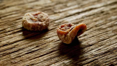 dried figs on wooden table 4k