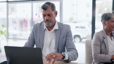 Collaboration,-computer-and-laptop-with-senior