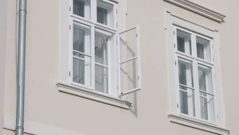 open window gently moving in the wind