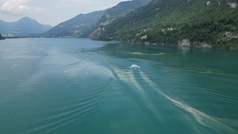 captivating sight of boat gracefully cutting through sediments on lake surface