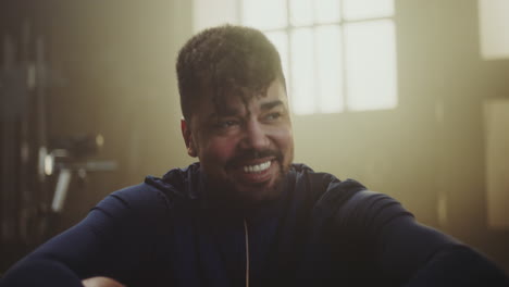 happy men talking in gym