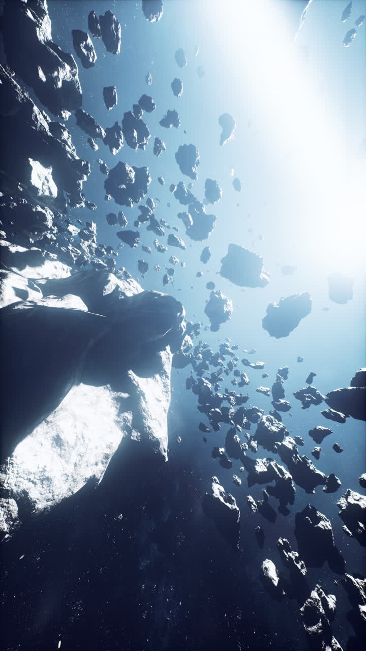 Enormous cluster of menacing asteroids amidst a hazy galaxy vertical