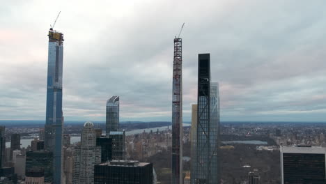 pan of nyc billionaire's row skyscrapers under construction