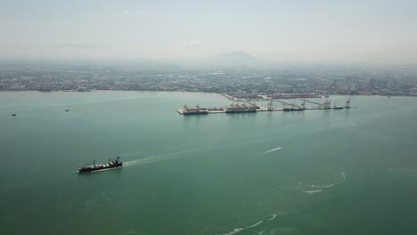 container ship leaving container terminal butterworth.