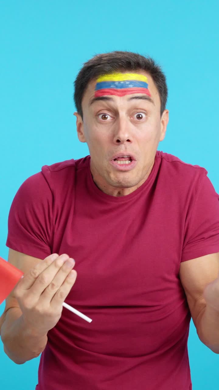 Man Cheering for Venezuela, angry with the decision of referee