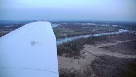 Pilot's-View-of-Barnston-Island-from-Flying-Airplane---Overcast-Day