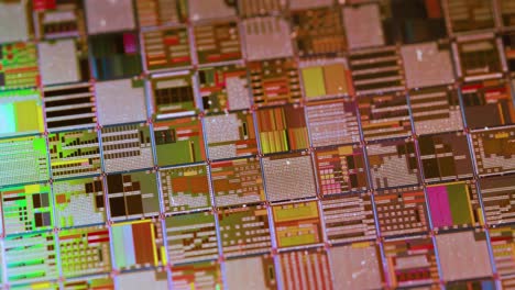 Silicon-semiconductor-wafer-close-up.-In-electronics,-a-wafer-also-called-a-slice-or-substrate-is-a-thin-slice-of-semiconductor,-a-crystalline-silicon,-used-for-the-fabrication-of-integrated-circuits