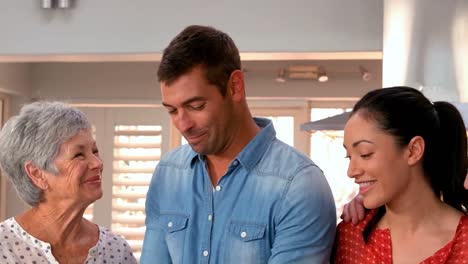 Family-cutting-vegetables-together