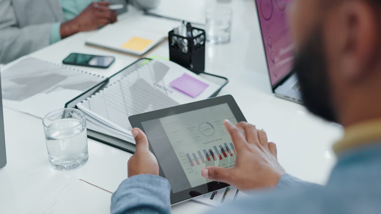 Planning, graph and business people on tablet