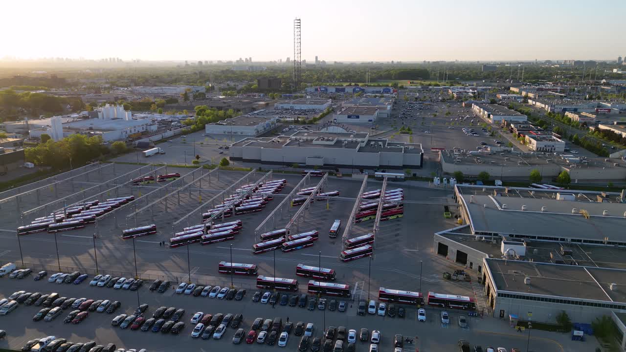 Public transit electric buses charging and driving from urban city transportation facility