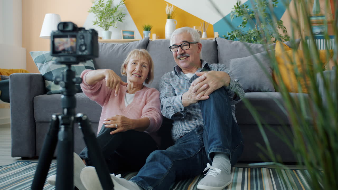 Senior Couple Vlogging in Living Room