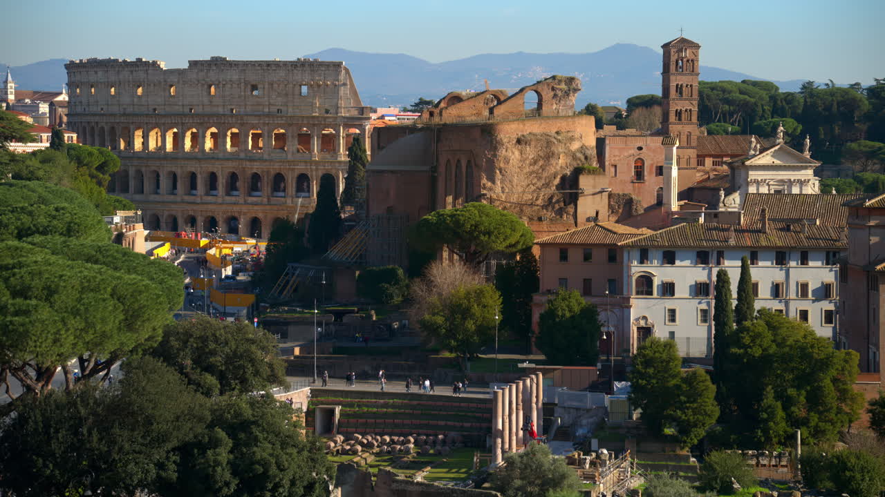 Distant view of the Colosseum with city view in the background, Rome, Italy